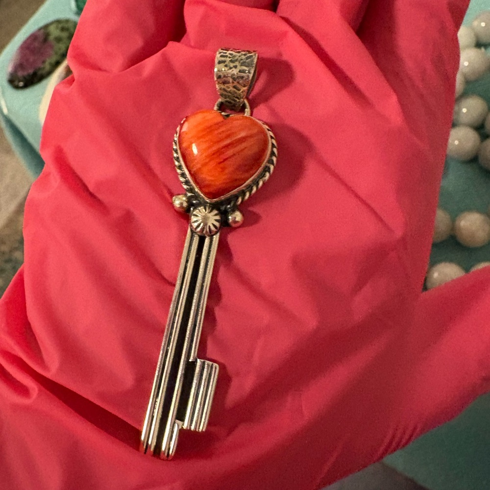 Red spiny sterling silver key pendant